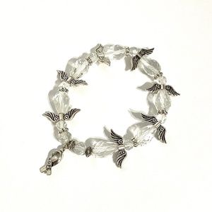 Angel bracelet with clear glass beads.